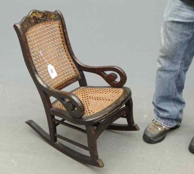 Appraisal: th c child's rocking chair in original paint decoration