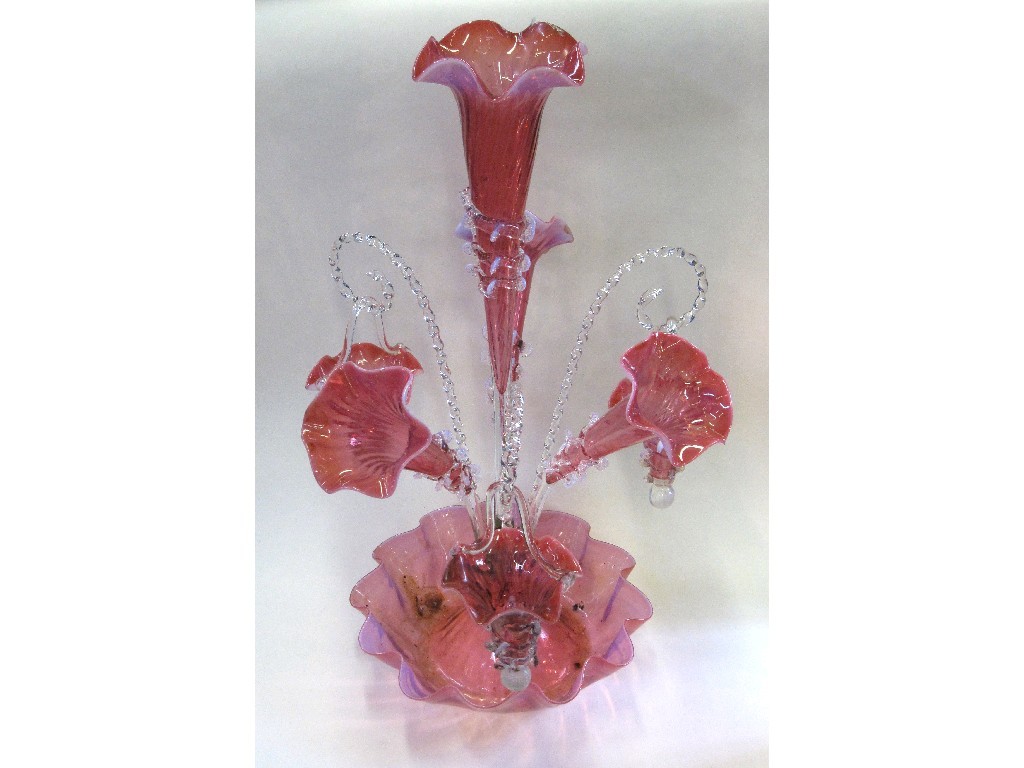 Appraisal: Cranberry and opaque glass epergne with hanging baskets and twisted