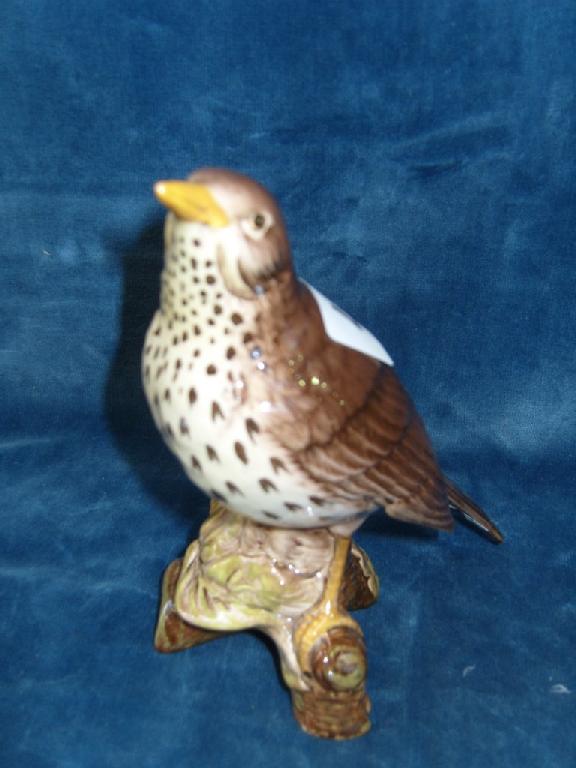 Appraisal: A Beswick model of a thrush with impressed number to