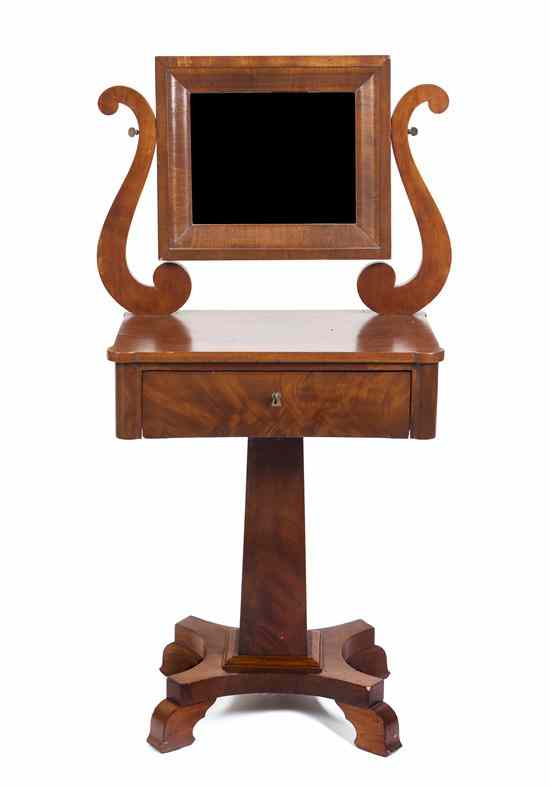 Appraisal: An American Classical Walnut Mirrored Washstand the rectangular plate flanked