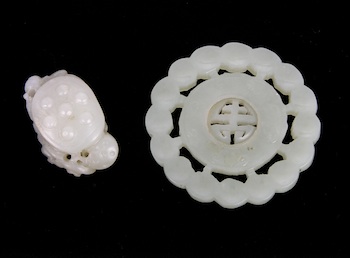 Appraisal: Two Carved Jade Ornaments Chinese Containing a carved pale green