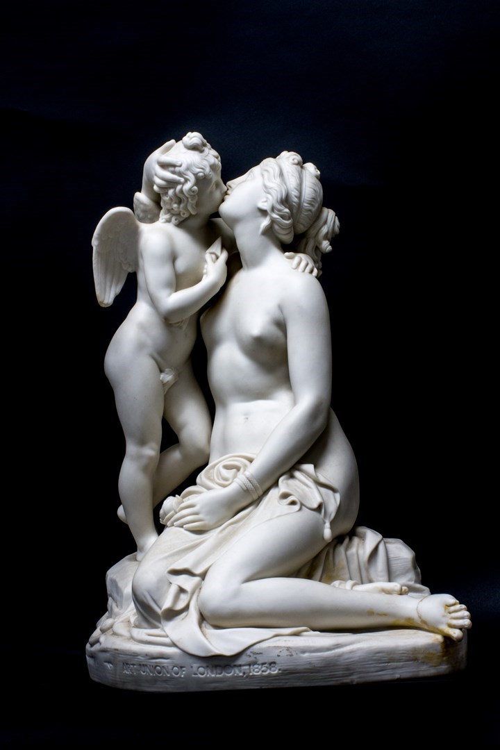 Appraisal: A parian figure group of 'Venus and Cupid' titled base