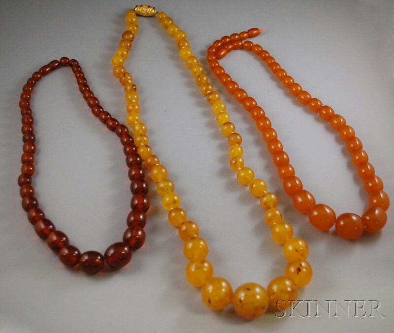 Appraisal: Three Amber Beaded Necklaces