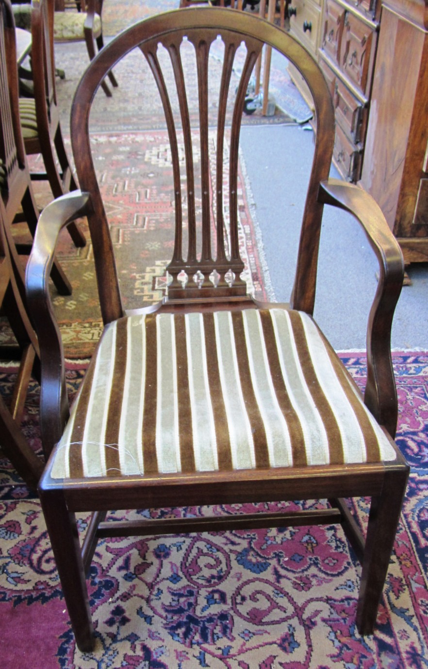 Appraisal: A set of eight h century mahogany dining chairs on