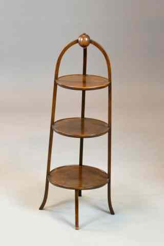 Appraisal: ORINICO THREE TIERED MAHOGONY PIE STANDKnob finial bentwood three tiered