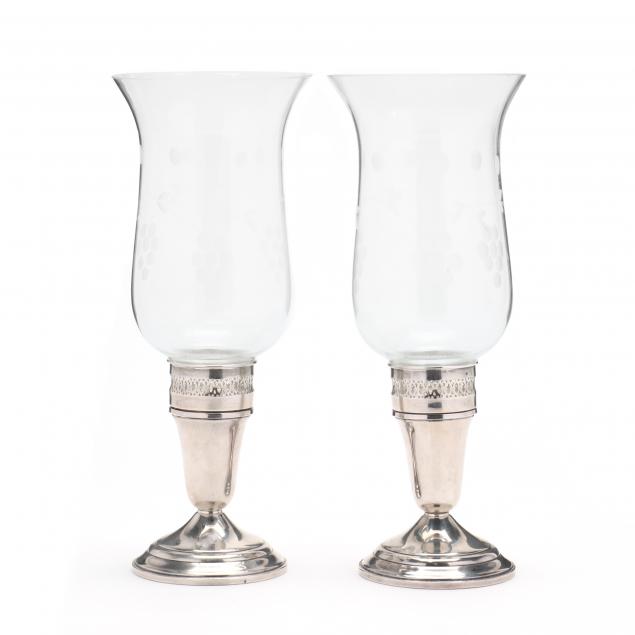 Appraisal: PAIR OF STERLING SILVER CANDLESTICKS WITH HURRICANE SHADES Third quarter