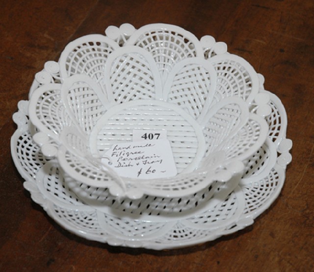 Appraisal: A FILIGREE PORCELAIN BOWL ON STAND Probably continental Of flared