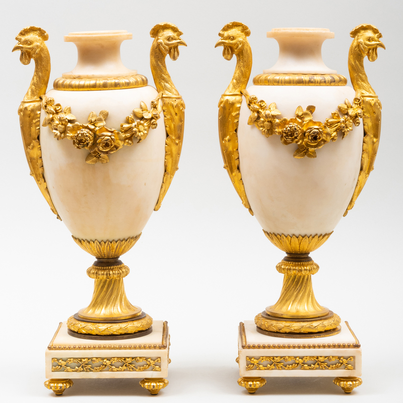 Appraisal: PAIR OF LOUIS XVI STYLE GILT-BRONZE-MOUNTED MARBLE URNS x x