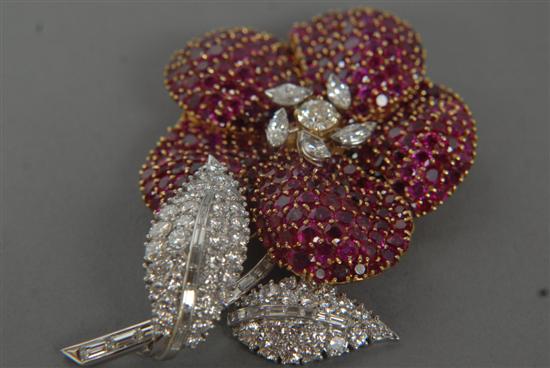 Appraisal: FRENCH INVISIBLY SET RUBY AND DIAMOND BROOCH Invisibly-set ruby and