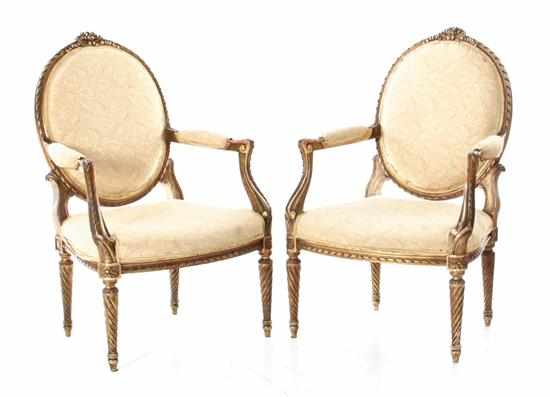 Appraisal: Pair Louis XVI style carved giltwood armchairs th century bow