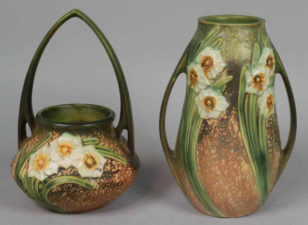 Appraisal: ROSEVILLE POTTERY JONQUIL BASKET WITH ARCHED HANDLE decorated with jonquils