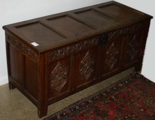 Appraisal: Fine th c English oak carved panel coffer w x