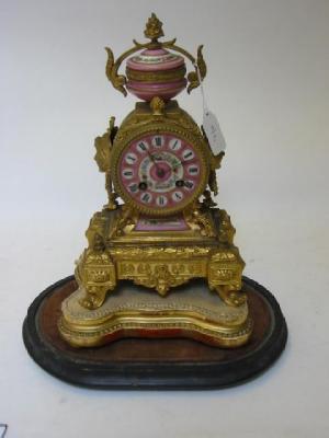 Appraisal: A FRENCH GILT METAL AND PINK PORCELAIN MANTEL CLOCK c