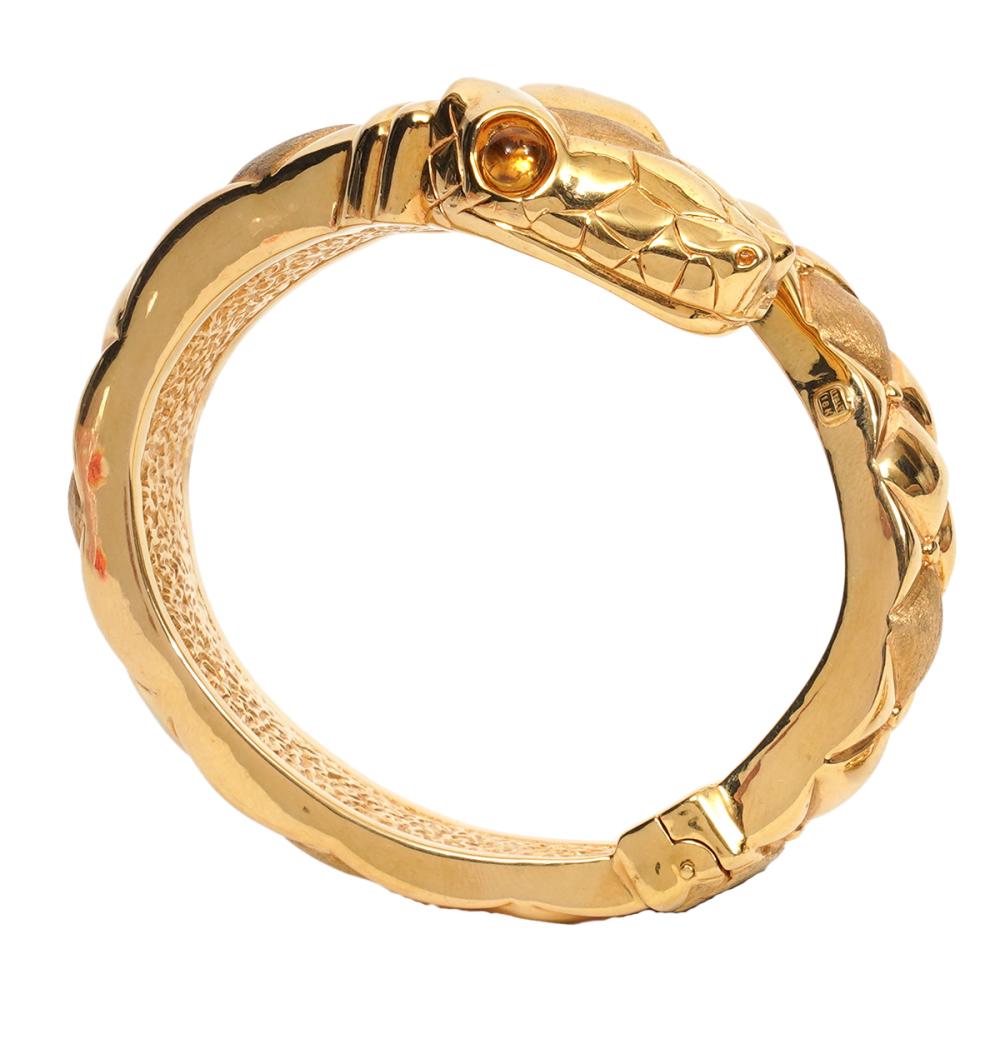 Appraisal: K YG CITRINE SNAKE HINGED BRACELET K yellow gold and