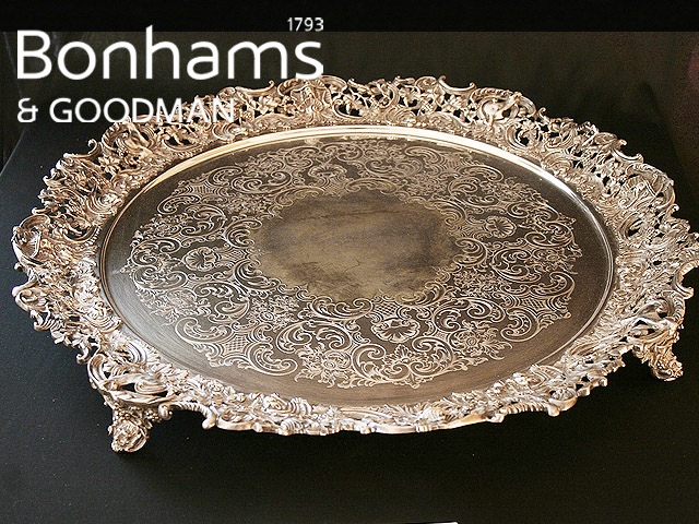 Appraisal: A handsome circular footed tray in silver and silver plate