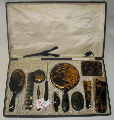 Appraisal: A VICTORIAN TORTOISE-SHELL FOURTEEN-PIECE VANITY DRESSING SET consisting of hand