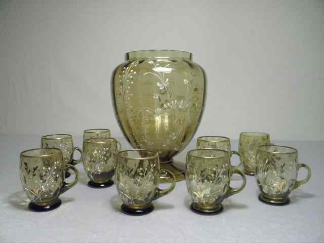 Appraisal: Enameled amber art glass cups and centerpiece which could be