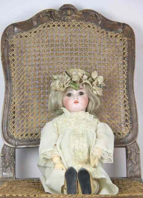 Appraisal: A Kammer Reinhardt bisque head doll impressed mark Simon Halbig