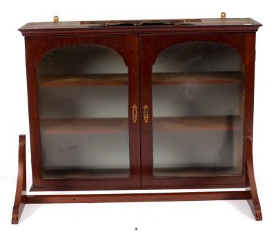 Appraisal: A small mahogany hanging cupboard enclosed by a pair of