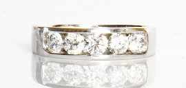 Appraisal: An ct white gold five stone channel set diamond band