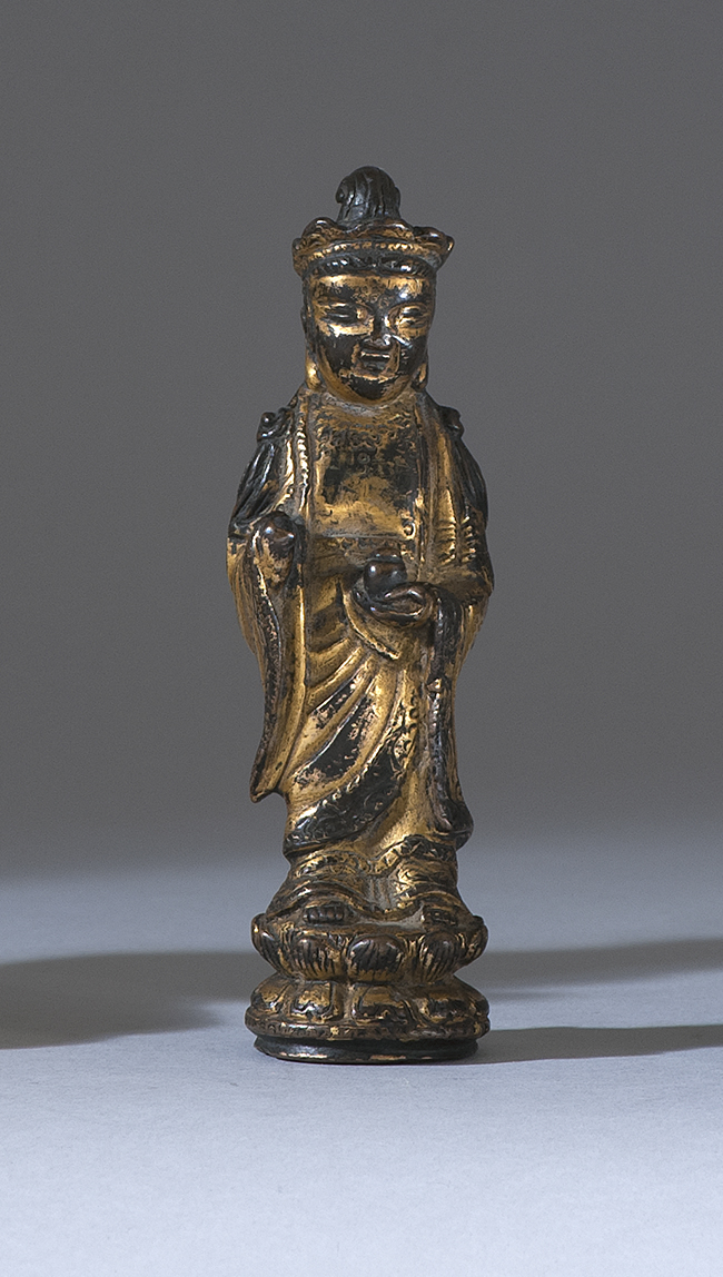 Appraisal: GILT-BRONZE FIGURE OF GUANYIN Ming DynastyIn standing position on a