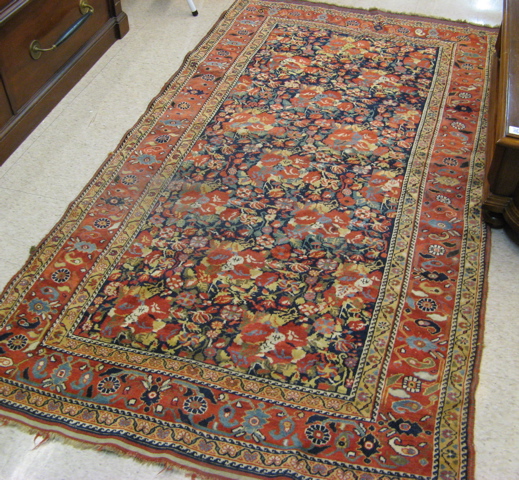 Appraisal: SEMI-ANTIQUE PERSIAN TRIBAL AREA RUG overall floral design hand knotted