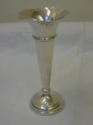 Appraisal: A VASE OF TRUMPET FORM with waved rim and moulded