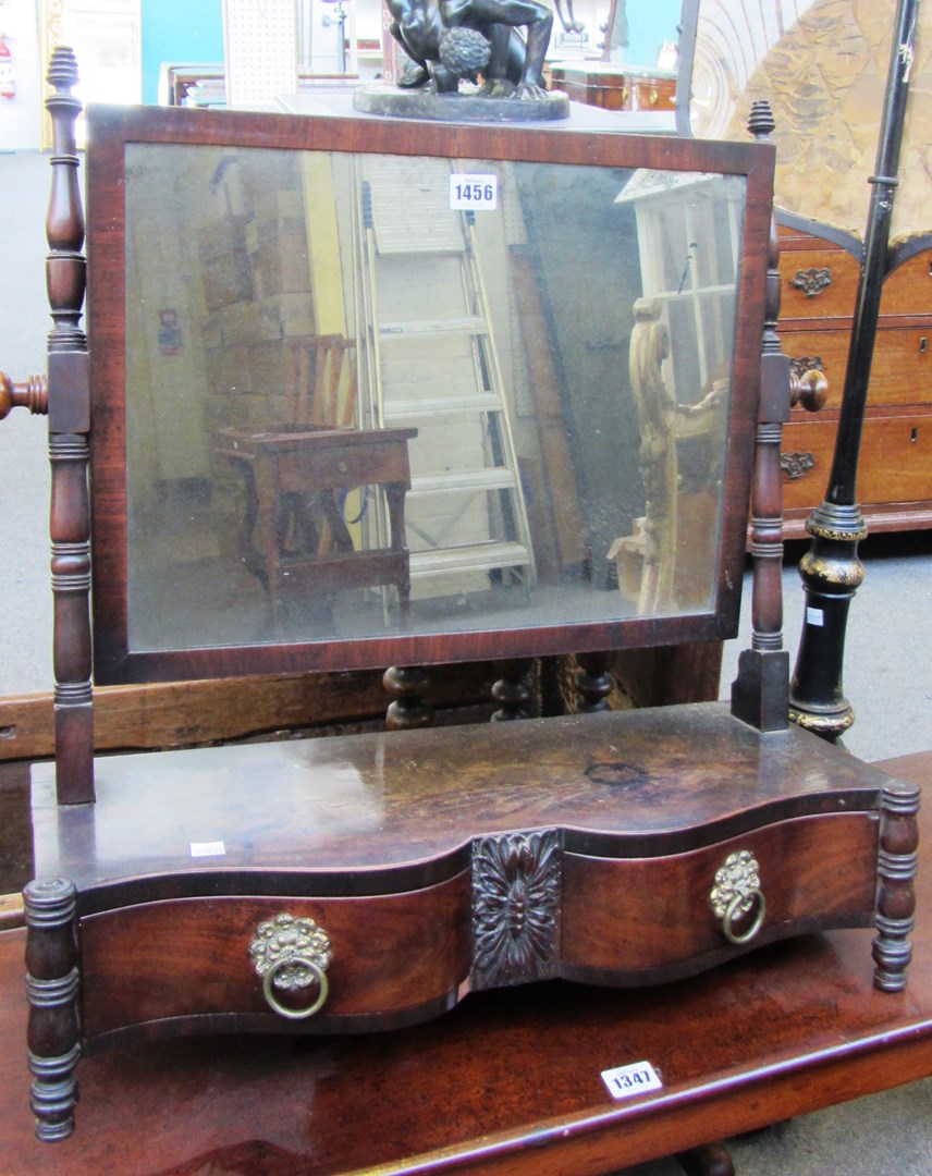 Appraisal: A William IV mahogany toilet mirror with serpentine two drawer