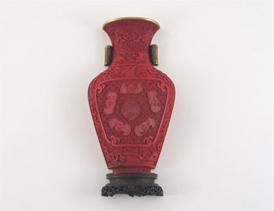 Appraisal: A Chinese gilt metal mounted red lacquer wall vase carved