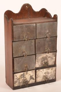 Appraisal: Wall Mounted Spice Box Eight tin drawers having ring handles