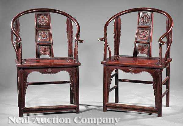 Appraisal: A Pair of Chinese Carved Hardwood Armchairs horseshoe back with