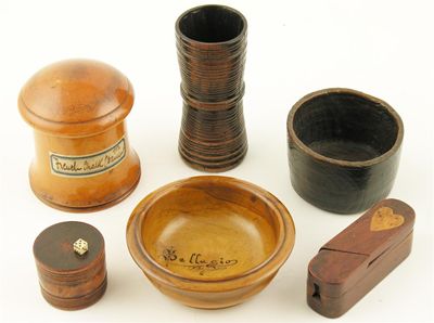 Appraisal: An early th century turned lignum vitae dice shaker in