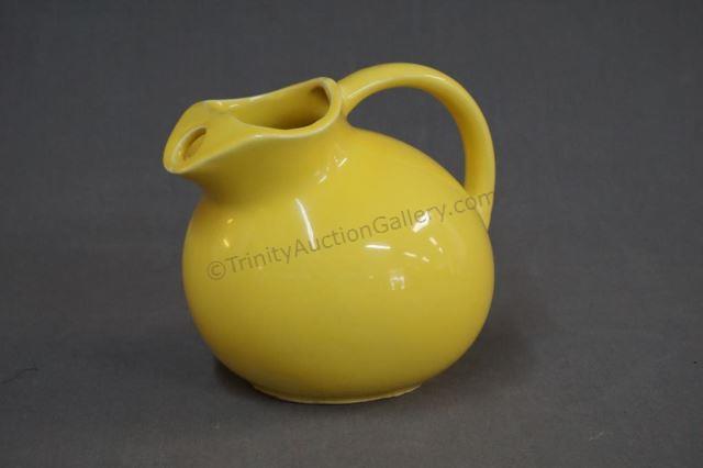 Appraisal: Vintage USA Pottery Yellow oz Tilt Ball Pitcher With Ice