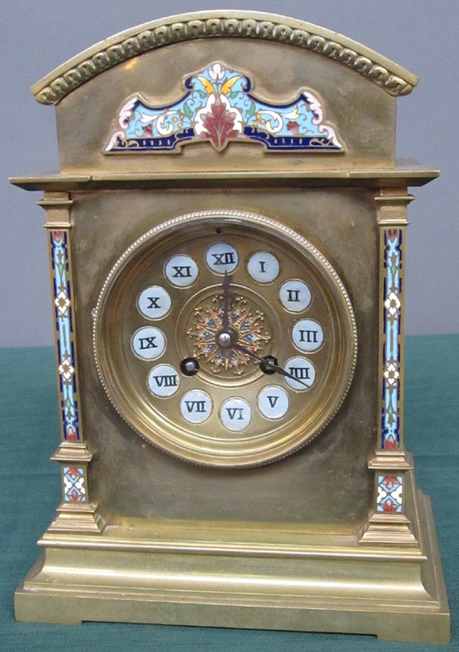 Appraisal: BRASS MANTLE CLOCK With enamel decoration