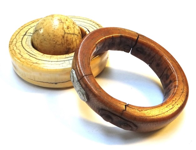 Appraisal: An th century carved ivory tusk bangle a f cm