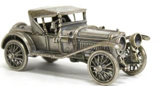 Appraisal: Solid Silver Antique s Touring Car Model Finely cast with