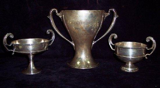 Appraisal: A two-handled prize cup of tapering form with presentation inscription