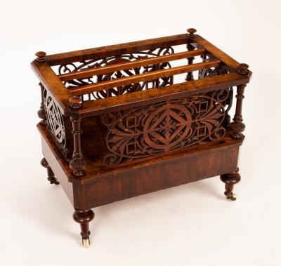 Appraisal: A Victorian figured walnut music Canterbury with pierced divisions fitted