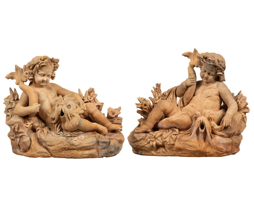 Appraisal: PAIR OF LARGE CONTINENTAL TERRACOTTA CHERUB FIGURESunsigned Provenance Chuck Fries