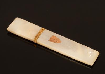 Appraisal: A mother-of-pearl gold mounted needle case with monogrammed cartouche cm