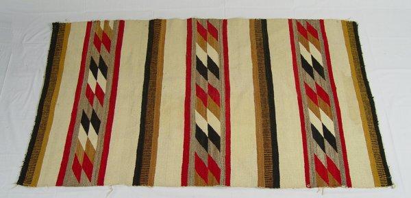 Appraisal: NAVAJO SADDLE BLANKET Circa 's geometric design Measures '' x