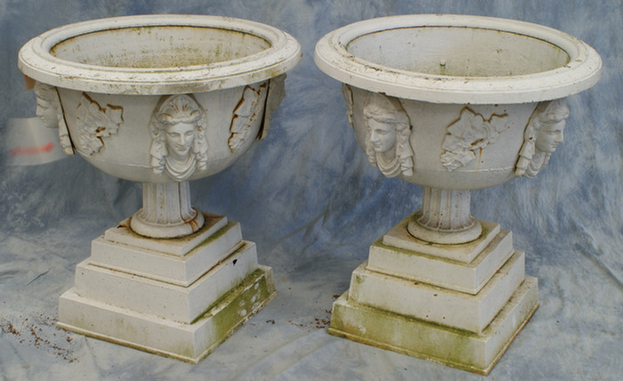 Appraisal: Pair of th c cast iron planters with applied ladies