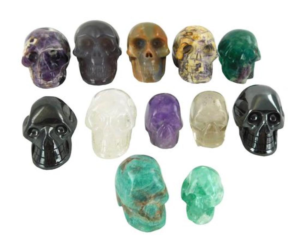 Appraisal: Carved hardstone skulls pieces th C semi-precious stones include agate