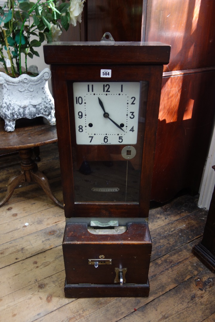 Appraisal: National Time Recorder Co Ltd a mahogany cased time clock