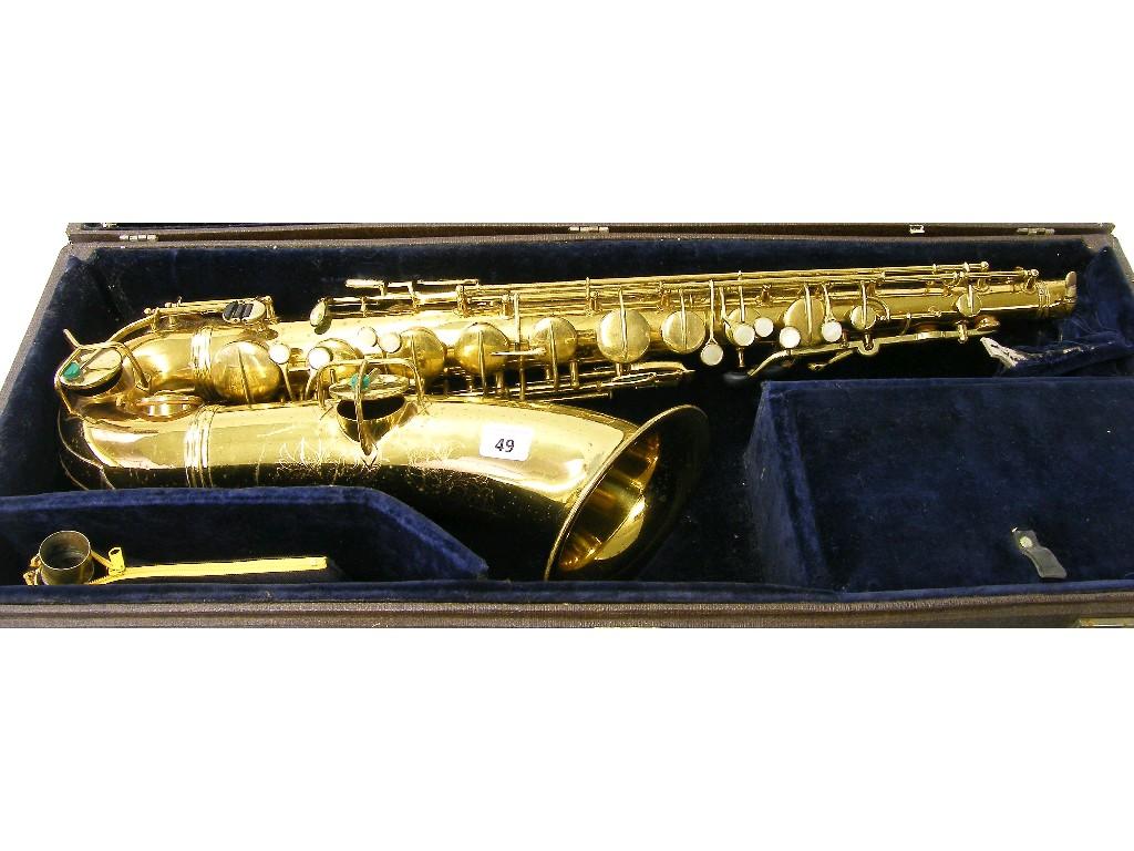 Appraisal: Elkhart gold lacquered tenor saxophone the foliate engraved bell stamped