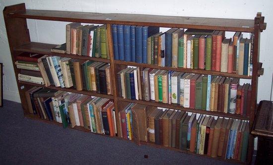 Appraisal: An oak open four-tier bookcase cm wide