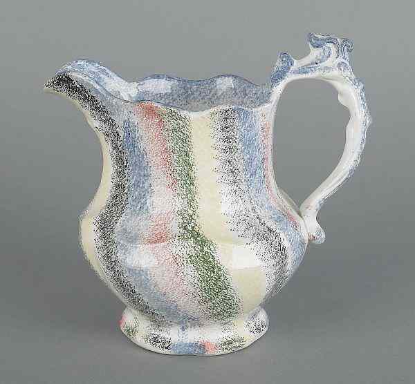 Appraisal: Five color rainbow spatter pitcher th c h