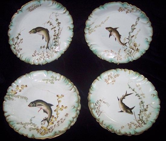 Appraisal: Four French plates painted fish and two others