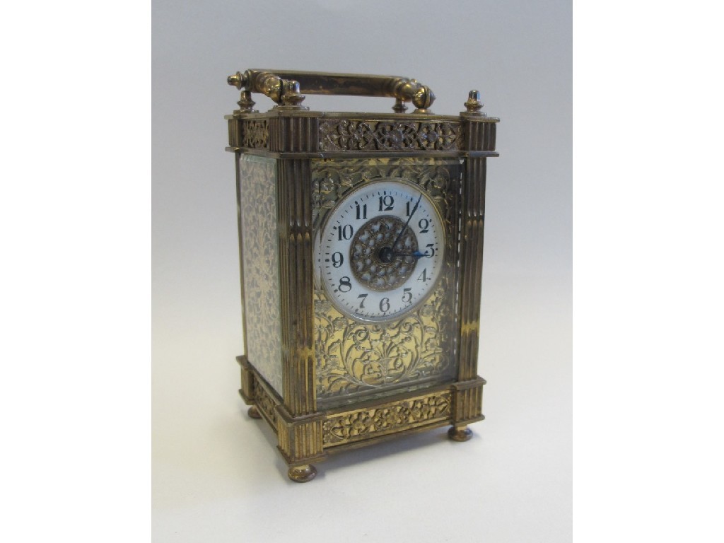 Appraisal: Brass cased carriage clock with pierced foliate decoration