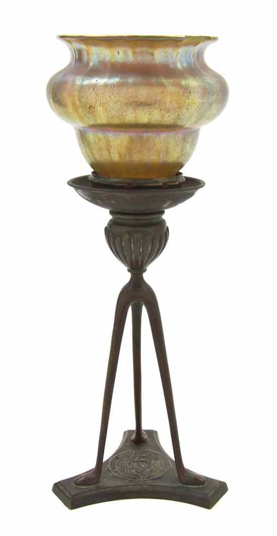 Appraisal: A Tiffany Studios Patinated Bronze Candlestick of tripod organic form